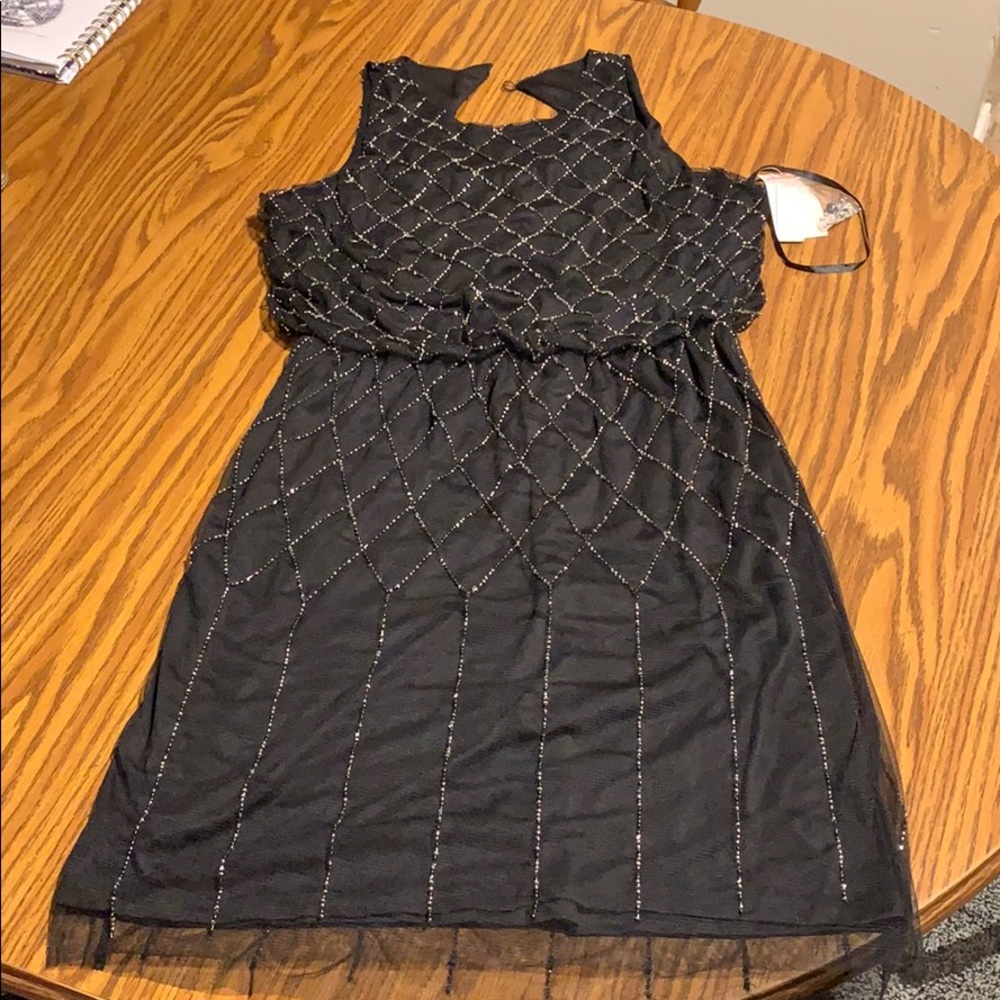 Black dress with black and white breading